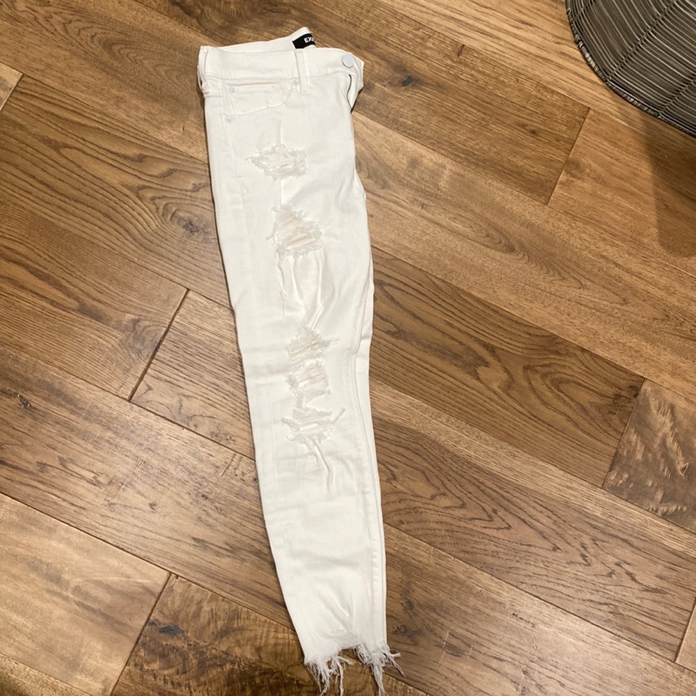 White distressed stretchy jeans from express